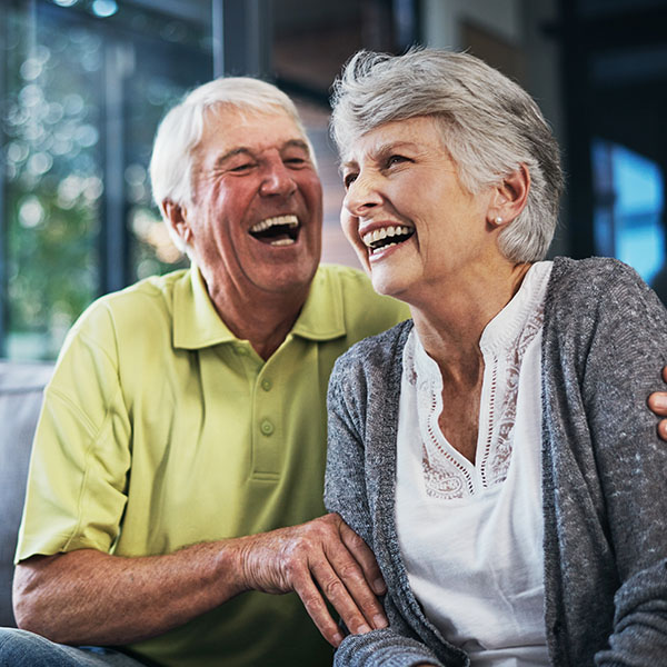 Happy elderly couple smiling and enjoying their time
