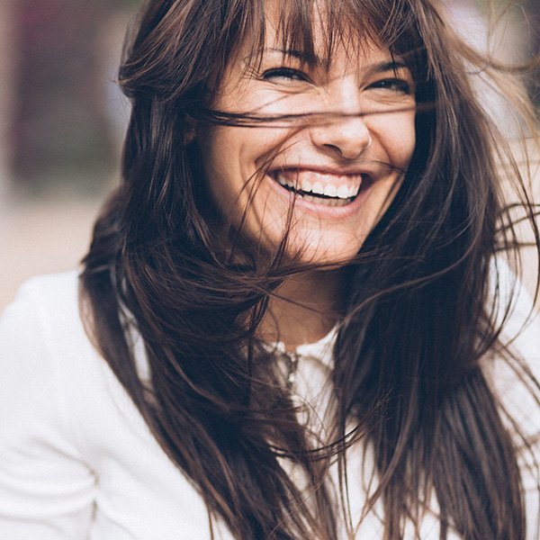 Happy woman smiling with beautiful teeth