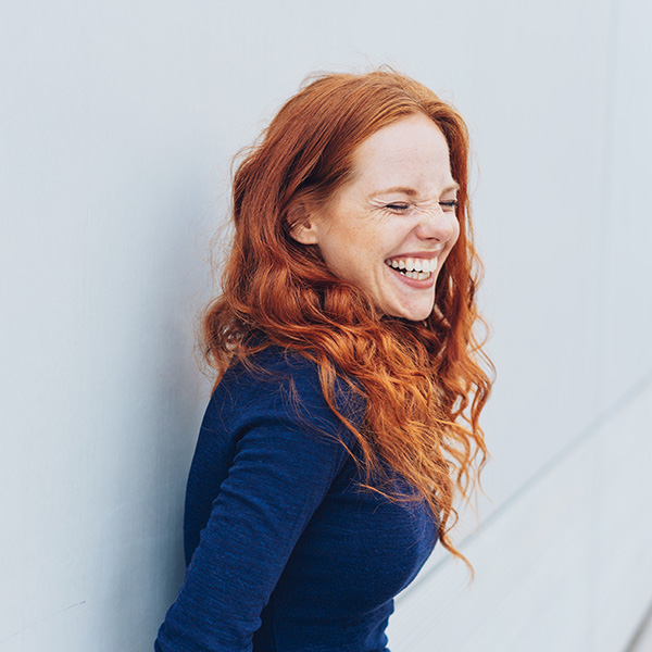 Happy woman smiling with beautiful teeth