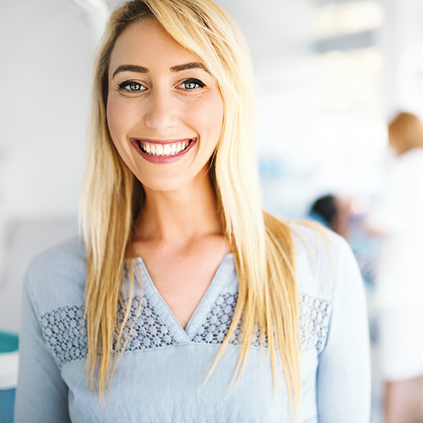 Happy woman smiling with beautiful teeth