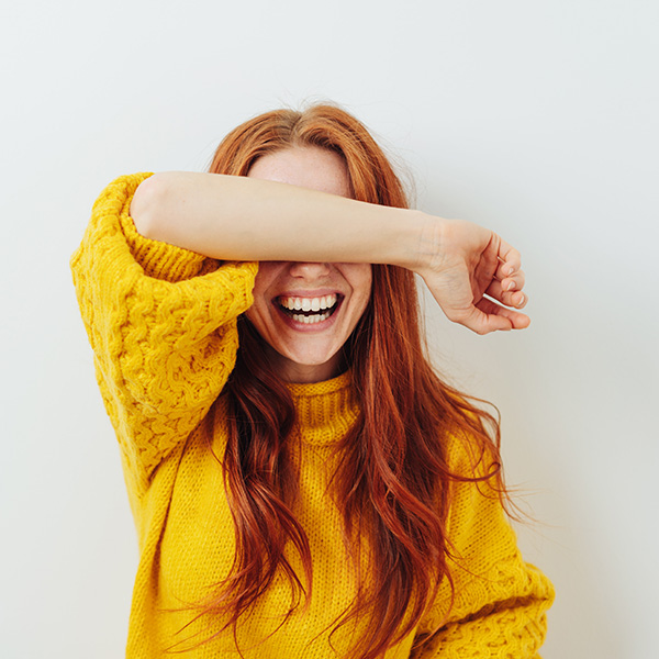 Happy woman smiling with beautiful teeth