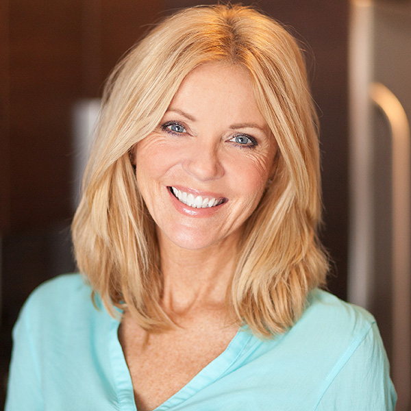 Happy woman smiling with beautiful teeth