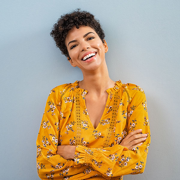 Happy woman smiling with beautiful teeth