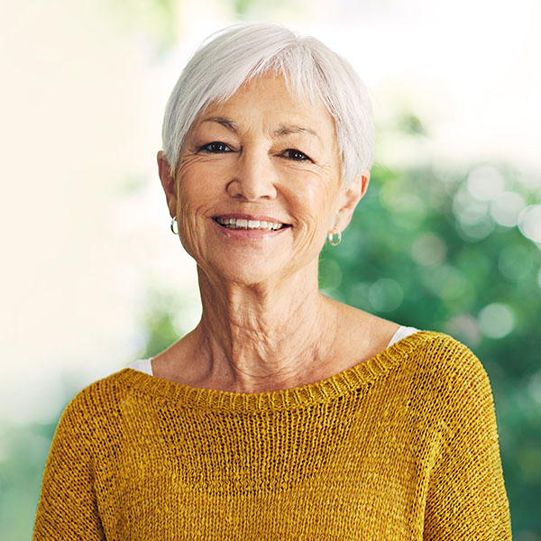 Happy woman smiling with beautiful teeth